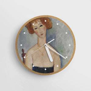 Red Headed Woman Wearing a Pendant